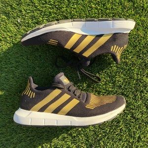 Adidas swift run gold and black sneaker